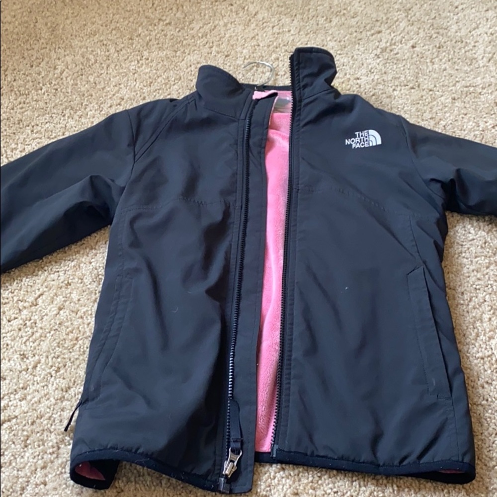 north face black jacket with pink inside